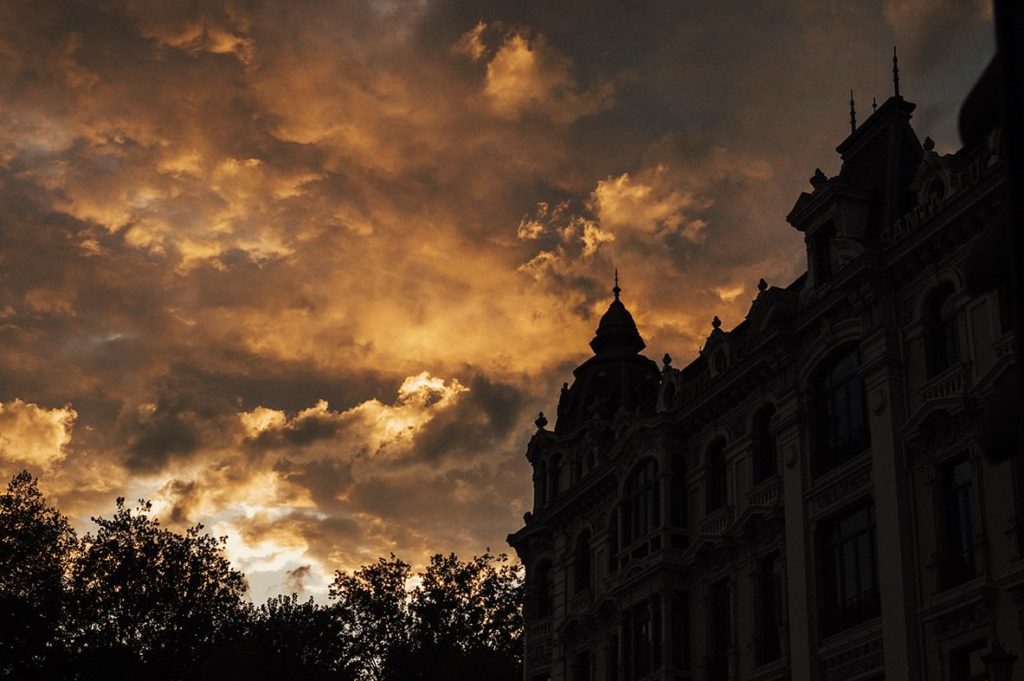 Oviedo at sunset with orange clouds during the golden hour